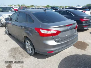 2013 Ford Focus SE with VIN 1FADP3F23DL131327, listed as a IAAI auction lot 42577474 with 146,412 mi miles and . Bid and sale history available at DreamBid. Image 3.