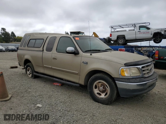 2000 Ford F-150 XL with VIN 1FTRX17L3YKB07018, listed as a Copart auction lot 66998714 with 0 mi miles and Salvage Title. Bid and sale history available at carsss.com. Image 4.