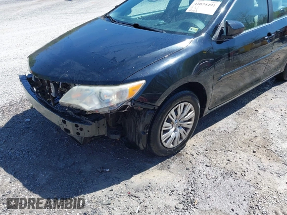 2014 Toyota Camry L with VIN 4T4BF1FK9ER408973, listed as a IAAI auction lot 42074491 with 183,934 mi miles and . Bid and sale history available at DreamBid. Image 17.