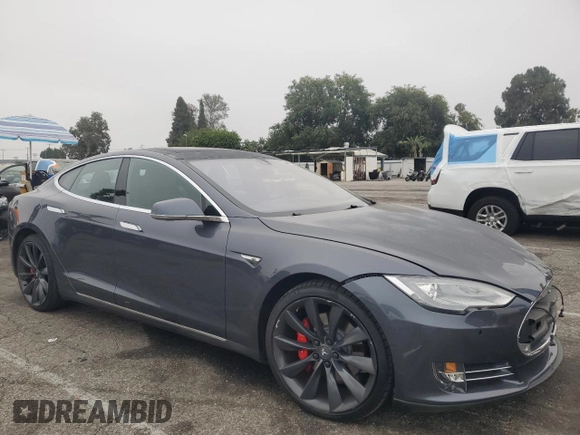 2014 Tesla Model S 60 with VIN 5YJSA1H10EFP60690, listed as a Copart auction lot 62515065 with 57,864 mi miles and Clean title. Bid and sale history available at DreamBid. Image 4.