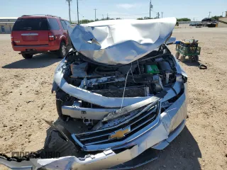 2015 Chevrolet Impala LT z VIN 2G1125S38F9176868, wystawiony jako Copart lot #56656935 z przebiegiem Nie podano mil oraz Szkoda całkowita • Salvage title. Historia ofert i sprzedaży dostępna na DreamBid. Obrazek 5.