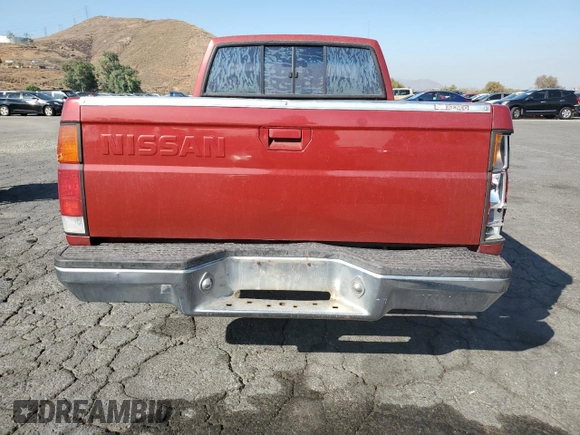 1989 Nissan Hardbody z VIN 1N6ND11S0KC342434, wystawiony jako Copart lot #71089274 z przebiegiem 300 076 mil mil oraz Szkody całkowita. Historia ofert i sprzedaży dostępna na DreamBid. Obrazek 6.