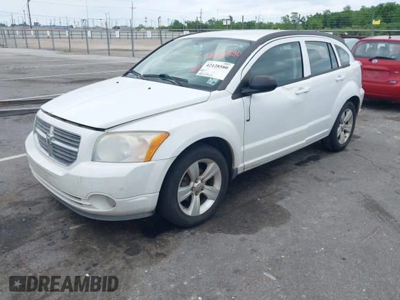 2011 Dodge Caliber Mainstreet with VIN 1B3CB3HA0BD157191, listed as a IAAI auction lot 42128580 with 185,474 mi miles. Bid and sale history available at carsss.com. Image 2.