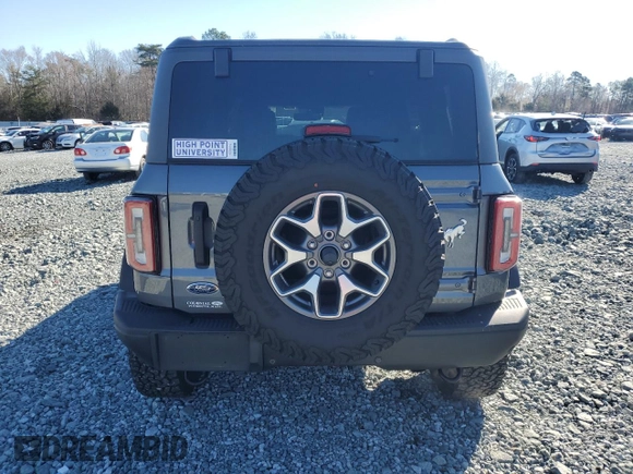 2023 Ford Bronco с VIN 1FMEE5DP6PLA81294, выставлен на аукционе Copart как лот 49076545 с пробегом 13 002 миль миль и На запчасти • Non repairable. История ставок и продаж доступна на DreamBid. Изображение 6.
