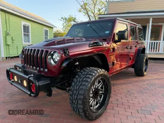 2021 Jeep Wrangler Unlimited Willys with VIN 1C4HJXDNXMW680247, listed as a Copart auction lot 57000145 with 77,407 mi miles and Clean Title. Bid and sale history available at DreamBid. Image 2.