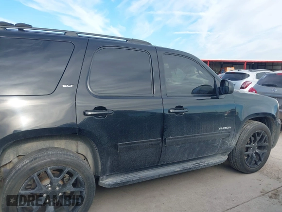 2012 GMC Yukon SLT with VIN 1GKS2CE06CR150096, listed as a IAAI auction lot 41703820 with 308,958 mi miles. Bid and sale history available at carsss.com. Image 13.