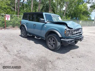 2022 Ford Bronco with VIN 1FMDE5BH9NLB83791, listed as a IAAI auction lot 42020801 with 26,141 mi miles. Bid and sale history available at carsss.com. Image 1.