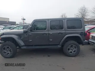 2021 Jeep Wrangler Unlimited Sahara z VIN 1C4JJXP68MW745098, wystawiony jako IAAI lot #41461092 z przebiegiem 36 410 mil mil oraz . Historia ofert i sprzedaży dostępna na DreamBid. Obrazek 15.