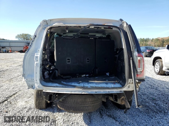 2020 GMC Yukon SLT with VIN 1GKS1BKC2LR248912, listed as a Copart auction lot 79935584 with 100,313 mi miles and Salvage Title. Bid and sale history available at DreamBid. Image 6.