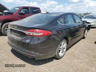 2018 Ford Fusion SE with VIN 3FA6P0HD0JR133698, listed as a Copart auction lot 62895245 with 82,077 mi miles and Salvage title. Bid and sale history available at DreamBid. Image 3.
