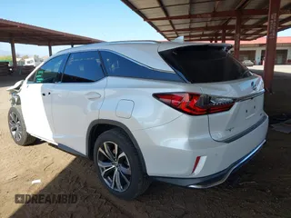 2018 Lexus RX with VIN JTJGZKCA3J2004499, listed as a IAAI auction lot 42019698 with 53,674 mi miles. Bid and sale history available at carsss.com. Image 3.