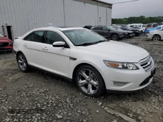 2012 Ford Taurus SHO with VIN 1FAHP2KT2CG141879, listed as a Copart auction lot 56558365 with 105,230 mi miles and Salvage title. Bid and sale history available at DreamBid. Image 4.