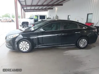 2016 Hyundai Sonata Hybrid SE with VIN KMHE24L12GA037983, listed as a IAAI auction lot 42078321 with 113,998 mi miles. Bid and sale history available at carsss.com. Image 14.