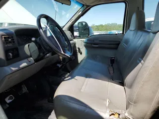 2002 Ford F-350 with VIN 1FDSF35F52EB01591, listed as a Copart auction lot 48350595 with 233,914 mi miles and Salvage title. Bid and sale history available at DreamBid. Image 7.