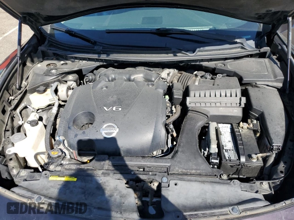 2010 Nissan Maxima SV z VIN 1N4AA5AP2AC867478, wystawiony jako Copart lot #55766955 z przebiegiem 170 812 mil mil oraz Szkoda całkowita • Salvage title. Historia ofert i sprzedaży dostępna na DreamBid. Obrazek 11.