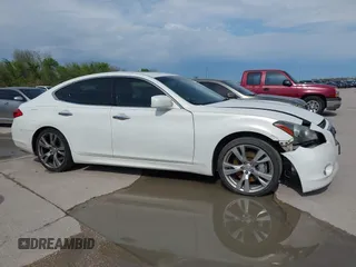 2013 Infiniti M with VIN JN1BY1AP4DM511067, listed as a IAAI auction lot 41890196 with 316,837 mi miles and . Bid and sale history available at DreamBid. Image 13.