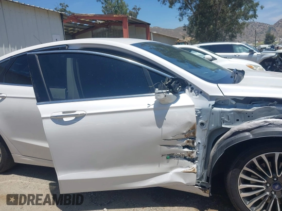 2017 Ford Fusion Titanium z VIN 3FA6P0SU0HR329224, wystawiony jako IAAI lot #42291605 z przebiegiem 176 728 mil mil oraz . Historia ofert i sprzedaży dostępna na DreamBid. Obrazek 19.