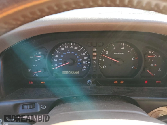2000 Toyota Land Cruiser with VIN JT3HT05J9Y0121251, listed as a Copart auction lot 82313164 with 265,389 mi miles and Clean Title. Bid and sale history available at carsss.com. Image 9.