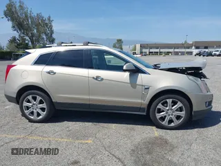 2011 Cadillac SRX Premium Collection z VIN 3GYFNCEY3BS506360, wystawiony jako IAAI lot #42096225 z przebiegiem 173 514 mil mil oraz . Historia ofert i sprzedaży dostępna na DreamBid. Obrazek 13.