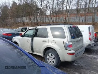 2009 Mercury Mariner z VIN 4M2CU91709KJ24606, wystawiony jako IAAI lot #41411160 z przebiegiem Nie podano mil oraz . Historia ofert i sprzedaży dostępna na DreamBid. Obrazek 14.