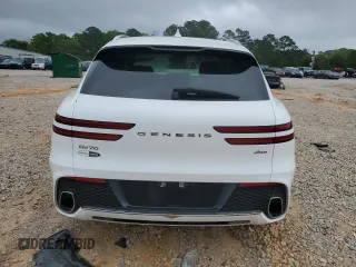 2022 Genesis GV70 2.5T z VIN KMUMADTB4NU061075, wystawiony jako Copart lot #51182065 z przebiegiem 50 457 mil mil oraz Szkoda całkowita • Salvage title. Historia ofert i sprzedaży dostępna na DreamBid. Obrazek 6.