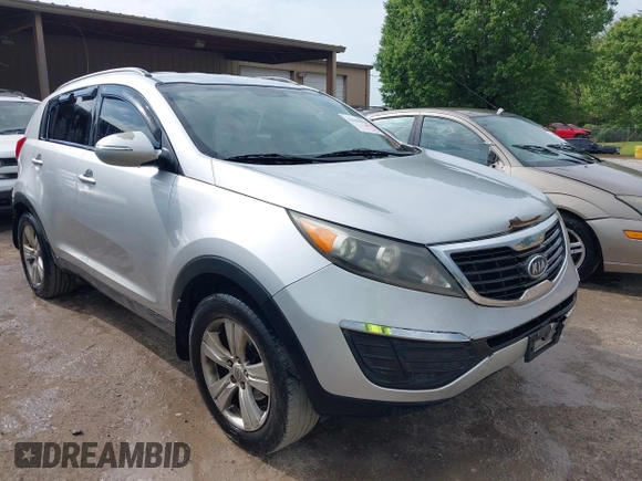 2011 Kia Sportage LX with VIN KNDPB3A23B7053943, listed as a IAAI auction lot 42063941 with 234,364 mi miles and . Bid and sale history available at carsss.com. Image 1.