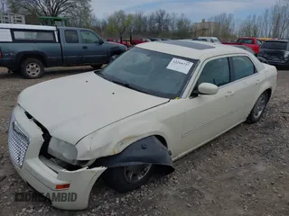 2006 Chrysler 300 Touring with VIN 2C3KA53G16H520826, listed as a IAAI auction lot 42204727 with 247,771 mi miles and . Bid and sale history available at carsss.com. Image 2.