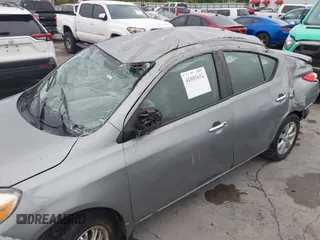 2014 Nissan Versa SV with VIN 3N1CN7AP0EL856205, listed as a IAAI auction lot 41893652 with 126,489 mi miles. Bid and sale history available at carsss.com. Image 6.