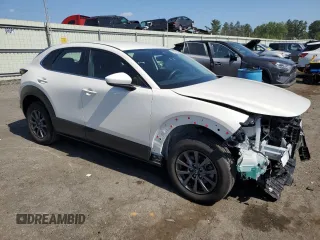 2024 Mazda CX-30 S with VIN 3MVDMBAMXRM680355, listed as a Copart auction lot 61815355 with 9,576 mi miles and Salvage title. Bid and sale history available at DreamBid. Image 4.