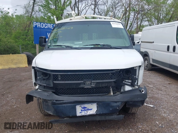 2016 Chevrolet Express Cargo with VIN 1GCWGAFF5G1261197, listed as a IAAI auction lot 42128029 with 117,535 mi miles and . Bid and sale history available at DreamBid. Image 12.