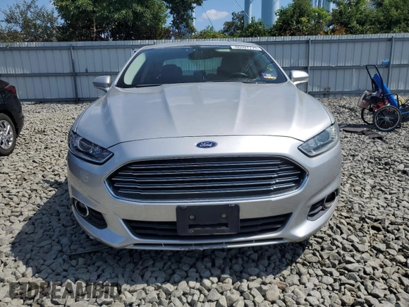 2013 Ford Fusion SE Hybrid with VIN 3FA6P0LU9DR217546, listed as a Copart auction lot 66597775 with Not provided miles and Clean title. Bid and sale history available at DreamBid. Image 5.