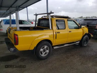 2001 Nissan Frontier SE z VIN 1N6ED27T91C326124, wystawiony jako Copart lot #50929905 z przebiegiem 212 615 mil mil oraz Szkoda całkowita • Salvage title. Historia ofert i sprzedaży dostępna na DreamBid. Obrazek 3.
