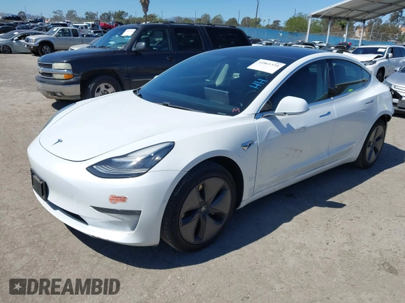 2019 Tesla Model 3 Mid Range with VIN 5YJ3E1EA1KF422983, listed as a IAAI auction lot 41861334 with 53,017 mi miles. Bid and sale history available at carsss.com. Image 20.