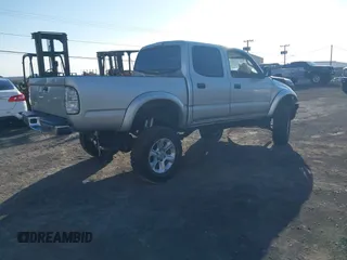 2002 Toyota Tacoma PreRunner with VIN 5TEGN92N42Z005511, listed as a IAAI auction lot 41313457 with Not Provided miles and . Bid and sale history available at DreamBid. Image 4.
