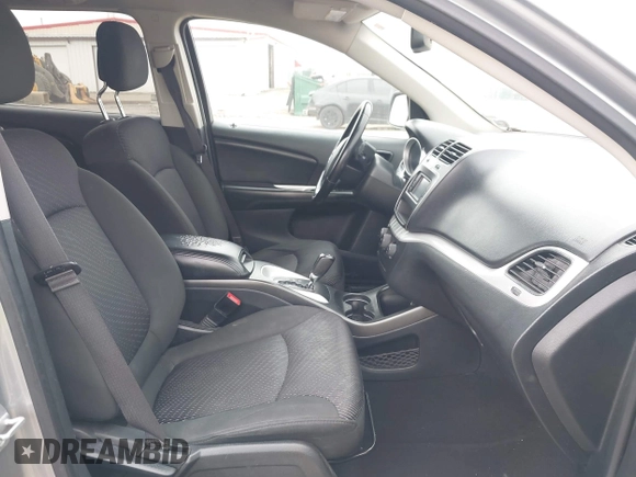 2019 Dodge Journey SE with VIN 3C4PDCBBXKT810874, listed as a IAAI auction lot 41960889 with 170,441 mi miles and . Bid and sale history available at DreamBid. Image 5.