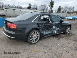2014 Audi A8 3.0T z VIN WAURGAFD1EN003340, wystawiony jako Copart lot #47531465 z przebiegiem Nie podano mil oraz Szkoda całkowita • Salvage title. Historia ofert i sprzedaży dostępna na DreamBid. Obrazek 3.