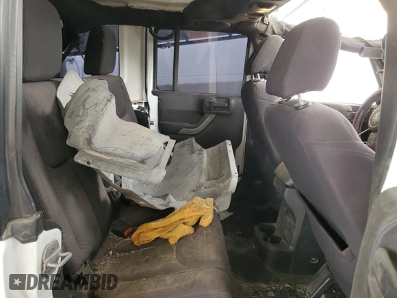 2013 Jeep Wrangler Unlimited Sport z VIN 1C4BJWDG8DL513680, wystawiony jako Copart lot #53805485 z przebiegiem 135 676 mil mil oraz Szkoda całkowita • Salvage title. Historia ofert i sprzedaży dostępna na DreamBid. Obrazek 11.