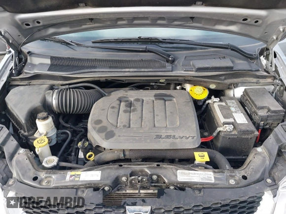 2019 Dodge Grand Caravan SXT with VIN 2C4RDGCG0KR786940, listed as a IAAI auction lot 41648332 with 96,427 mi miles and . Bid and sale history available at DreamBid. Image 10.