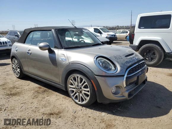 2016 MINI Convertible S with VIN WMWWG9C58G3A91318, listed as a Copart auction lot 46162435 with 30,643 mi miles and Salvage title. Bid and sale history available at DreamBid. Image 4.