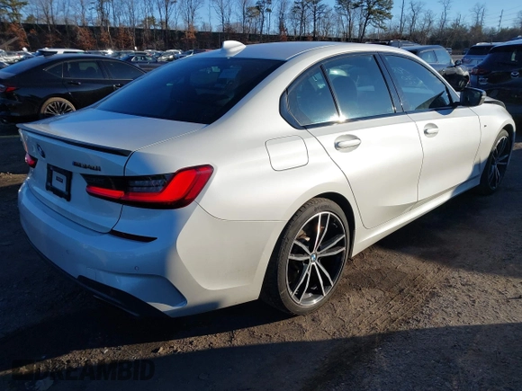 2020 BMW 3 Series M340i xDrive with VIN WBA5U9C00LFH73594, listed as a IAAI auction lot 41574837 with 46,702 mi miles and . Bid and sale history available at DreamBid. Image 4.