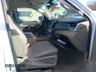 2017 Chevrolet Suburban Premier z VIN 1GNSKJKC9HR117378, wystawiony jako IAAI lot #41610682 z przebiegiem Nie podano mil oraz . Historia ofert i sprzedaży dostępna na DreamBid. Obrazek 5.