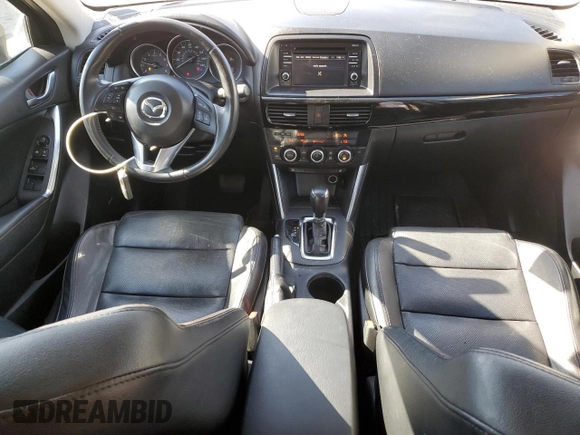 2015 Mazda CX-5 Grand Touring with VIN JM3KE4DY5F0460465, listed as a Copart auction lot 46392605 with 103,185 mi miles and Salvage Title. Bid and sale history available at carsss.com. Image 8.