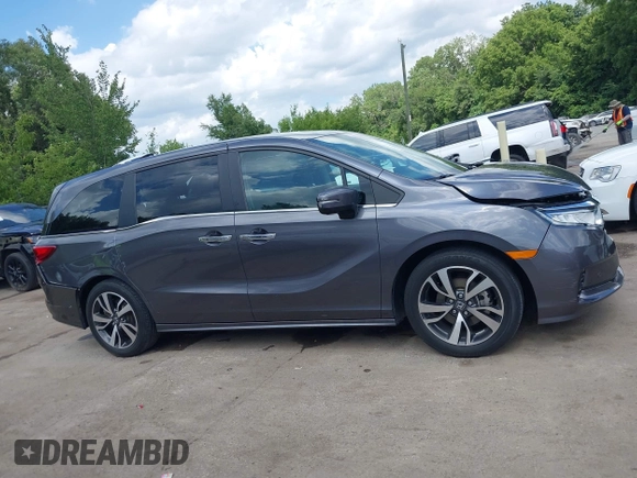 2022 Honda Odyssey Touring with VIN 5FNRL6H89NB008814, listed as a IAAI auction lot 42597738 with 49,933 mi miles and . Bid and sale history available at DreamBid. Image 13.