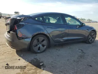 2023 Tesla Model 3 z VIN 5YJ3E1EA6PF621759, wystawiony jako Copart lot #63669045 z przebiegiem 20 094 mil mil oraz Szkoda całkowita • Salvage title. Historia ofert i sprzedaży dostępna na DreamBid. Obrazek 3.