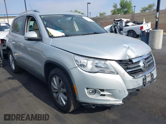 2011 Volkswagen Tiguan SEL with VIN WVGBV7AX2BW500817, listed as a IAAI auction lot 42292760 with 50,336 mi miles and . Bid and sale history available at DreamBid. Image 1.
