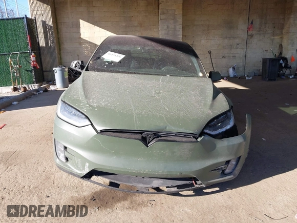 2020 Tesla Model X Long Range with VIN 5YJXCDE24LF272242, listed as a IAAI auction lot 41275226 with 103,731 mi miles. Bid and sale history available at carsss.com. Image 12.