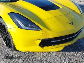 2014 Chevrolet Corvette Z51 3LT z VIN 1G1YL2D79E5118838, wystawiony jako IAAI lot #41815392 z przebiegiem Nie podano mil oraz . Historia ofert i sprzedaży dostępna na DreamBid. Obrazek 6.