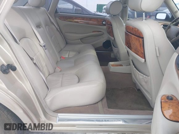 2000 Jaguar XJ Vanden Plas with VIN SAJDA24C7YLF13906, listed as a IAAI auction lot 41559262 with 122,586 mi miles and . Bid and sale history available at DreamBid. Image 8.