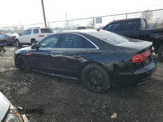 2016 Audi A8 with VIN WAUK3AFD8GN008759, listed as a Copart auction lot 81256324 with 86,244 mi miles and Salvage title. Bid and sale history available at DreamBid. Image 2.