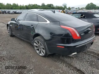 2013 Jaguar XJ Portfolio with VIN SAJWJ2GD0D8V44292, listed as a Copart auction lot 57073775 with 100,458 mi miles and Salvage Title. Bid and sale history available at DreamBid. Image 2.